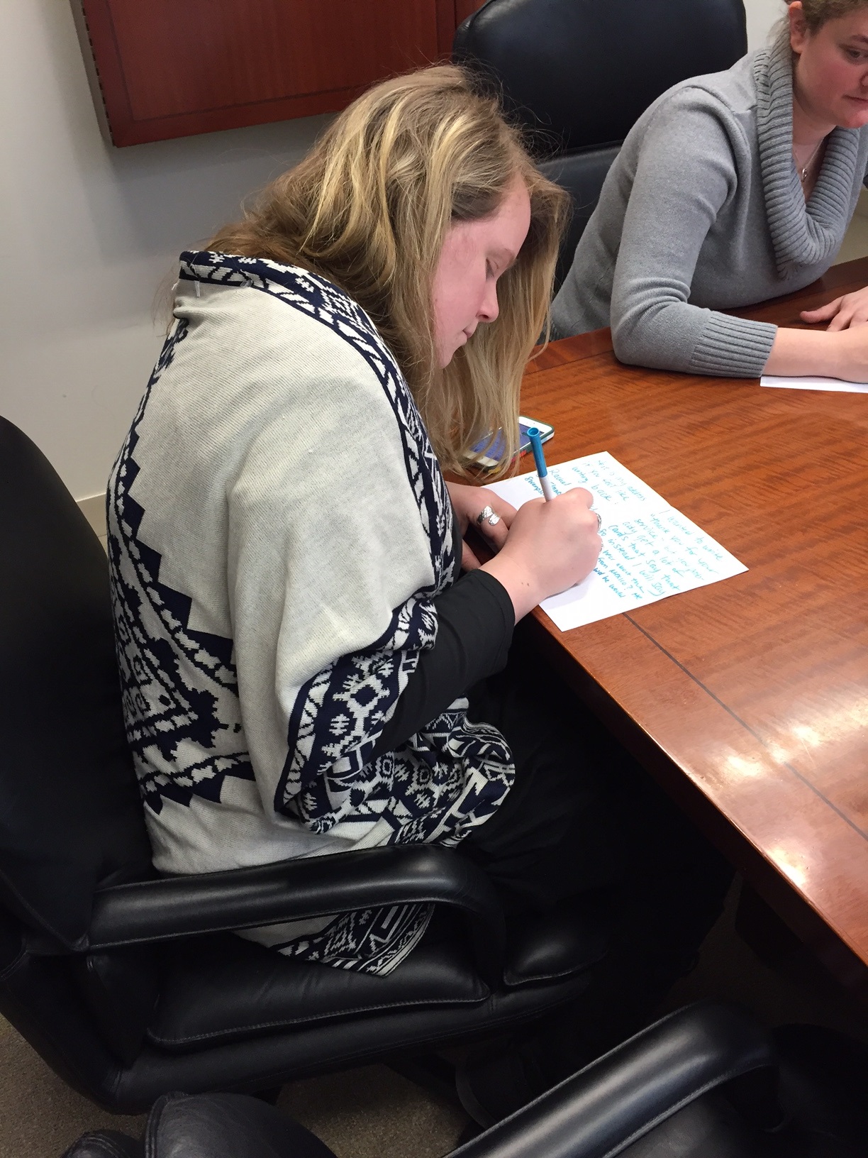 Rachel writing card to soldier